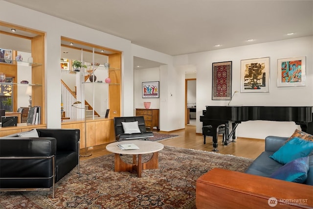 2337 NW 194th Pl, Shoreline, WA 98177 - living area featuring wood finished floors, stairway, and recessed lighting