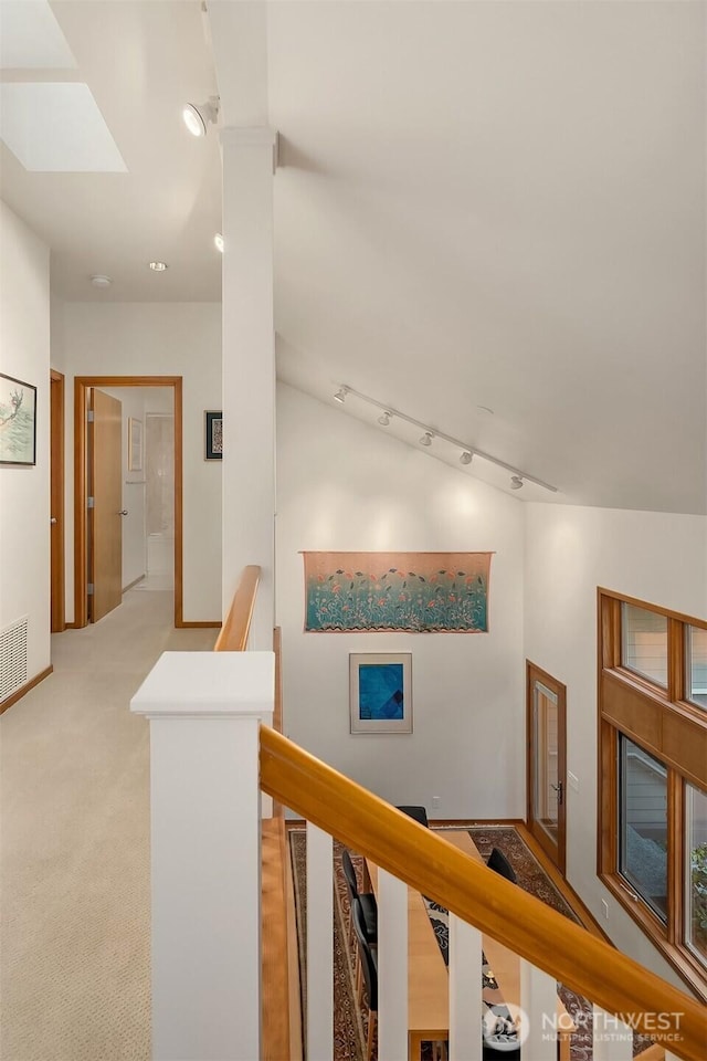 2337 NW 194th Pl, Shoreline, WA 98177 - corridor featuring an upstairs landing, recessed lighting, rail lighting, and light carpet