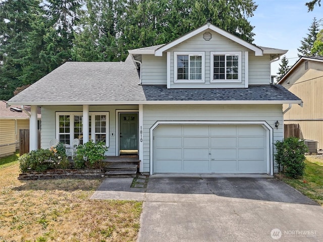 1810 S Tyler St, Tacoma, WA 98405 - traditional home featuring roof with shingles, a porch, concrete driveway, and a garage