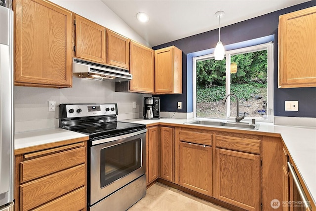 1810 S Tyler St, Tacoma, WA 98405 - kitchen with electric stove, under cabinet range hood, light countertops, hanging light fixtures, and vaulted ceiling