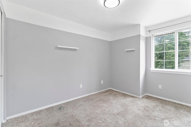 1810 S Tyler St, Tacoma, WA 98405 - spare room with carpet flooring and baseboards