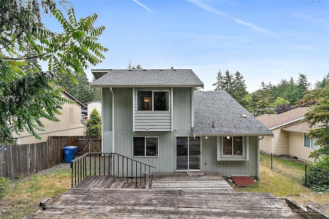 1810 S Tyler St, Tacoma, WA 98405 - rear view of property with a wooden deck, a fenced backyard, and roof with shingles