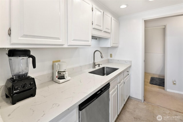 2201 3rd Ave Unit 1404, Seattle, WA 98121 - kitchen with dishwasher, white cabinets, light stone counters, and recessed lighting
