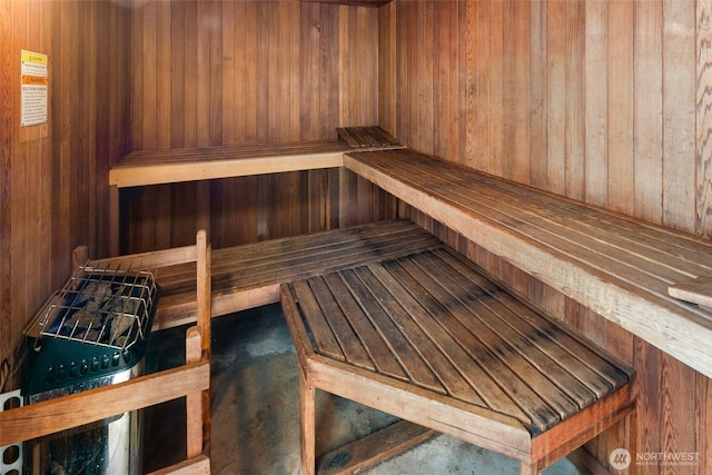 2201 3rd Ave Unit 1404, Seattle, WA 98121 - relaxing sauna / steam room featuring wooden walls and concrete floors