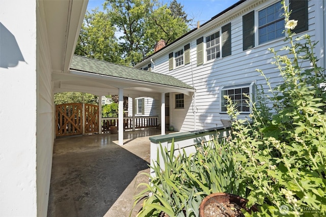 444 Washington St, Walla Walla, WA 99362 - property entrance featuring a chimney and roof with shingles