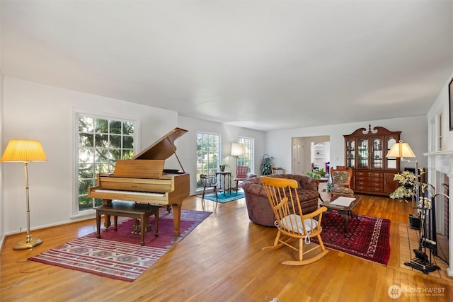 444 Washington St, Walla Walla, WA 99362 - living area with wood finished floors and a brick fireplace