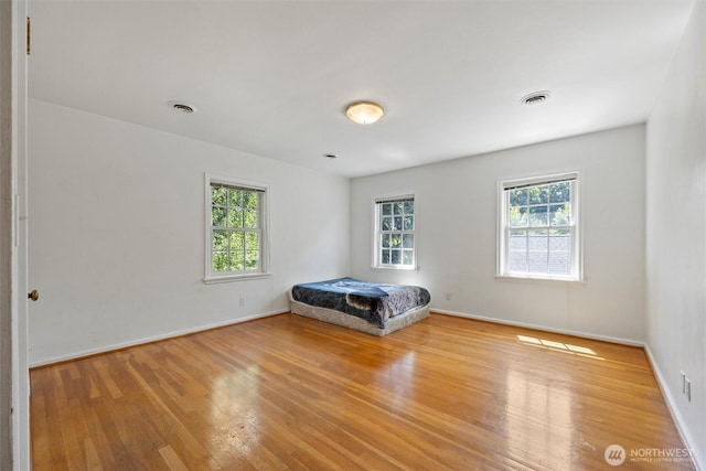 444 Washington St, Walla Walla, WA 99362 - unfurnished bedroom featuring light wood-type flooring and baseboards