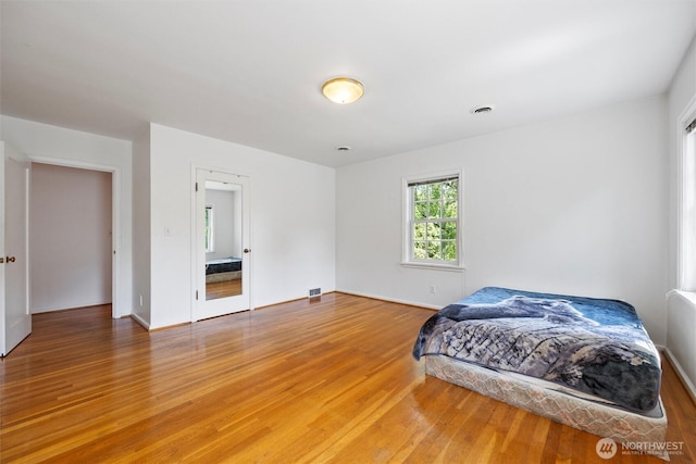444 Washington St, Walla Walla, WA 99362 - bedroom featuring light wood-style flooring and baseboards