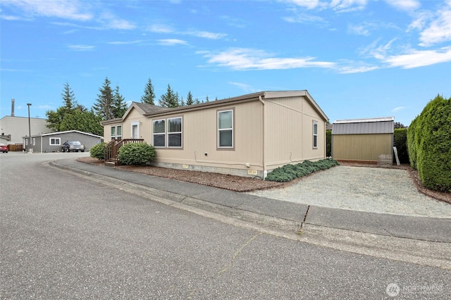 886 Carriage Ct, Sedro Woolley, WA 98284 - view of front of home featuring a shed and crawl space