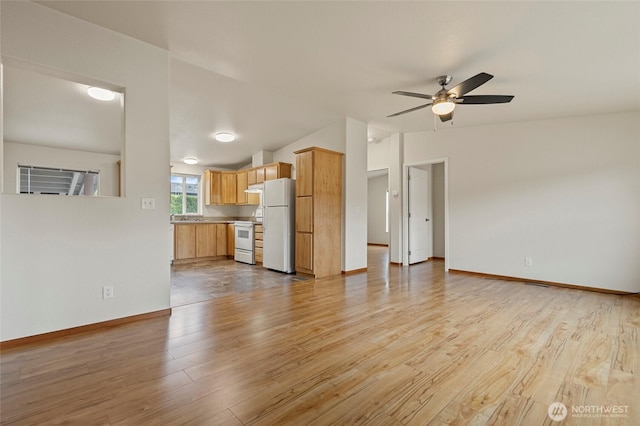 886 Carriage Ct, Sedro Woolley, WA 98284 - unfurnished living room featuring ceiling fan and light wood-style floors