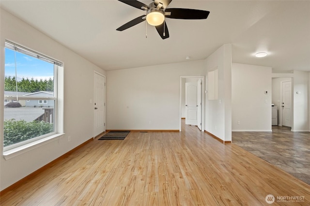 886 Carriage Ct, Sedro Woolley, WA 98284 - empty room with a ceiling fan, wood finished floors, and washer / dryer