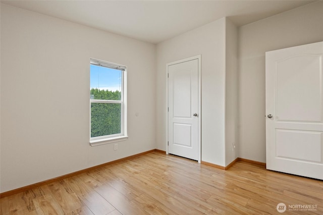 886 Carriage Ct, Sedro Woolley, WA 98284 - unfurnished bedroom featuring light wood-type flooring and baseboards