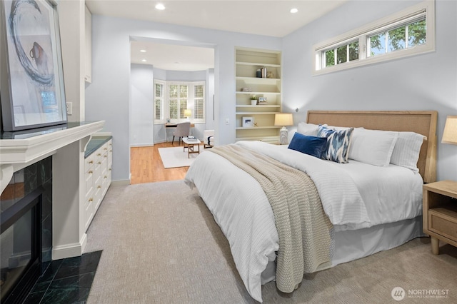 1510 38th Ave E, Seattle, WA 98112 - bedroom with a tile fireplace and recessed lighting