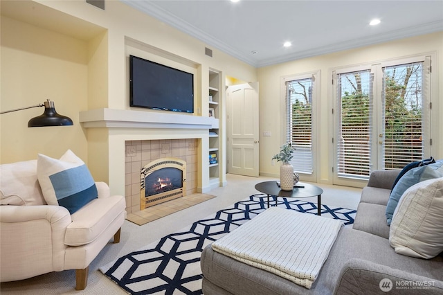 1510 38th Ave E, Seattle, WA 98112 - carpeted living area featuring built in shelves, crown molding, recessed lighting, and a tiled fireplace