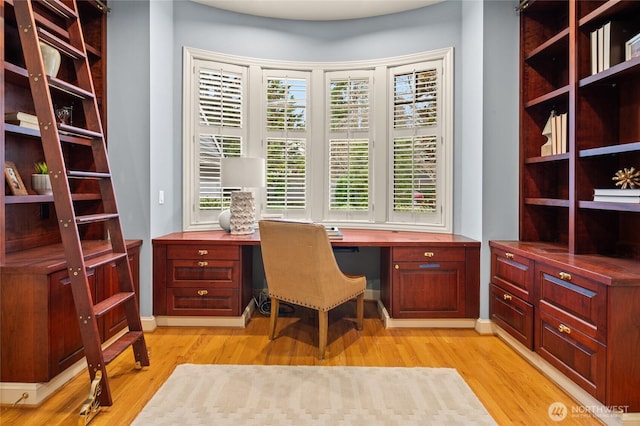 1510 38th Ave E, Seattle, WA 98112 - office space with built in study area and light wood-style floors