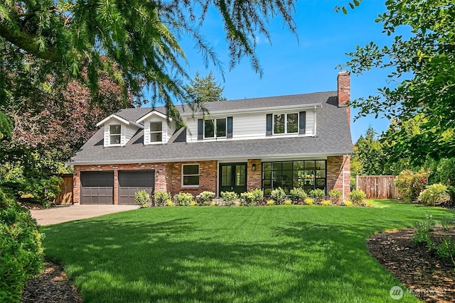 2534 Medina Cir, Medina, WA 98039 - view of front of property featuring driveway, a chimney, brick siding, and a garage