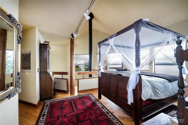 4722 53rd Ave SW, Seattle, WA 98116 - bedroom featuring wood finished floors and baseboards
