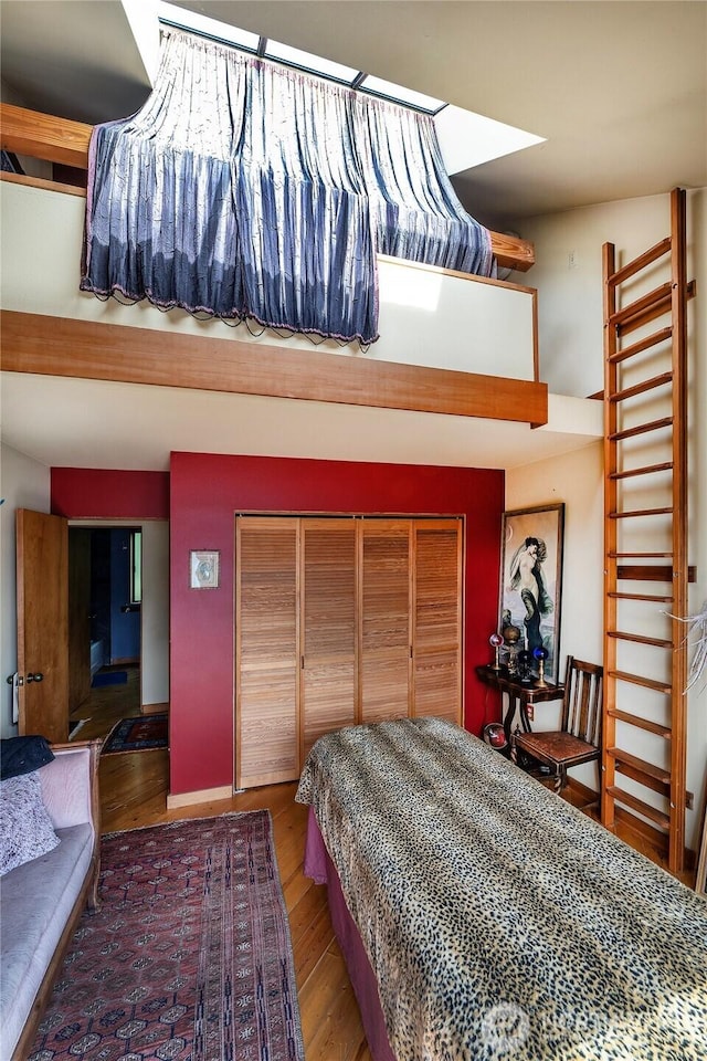 4722 53rd Ave SW, Seattle, WA 98116 - bedroom with wood finished floors and a closet