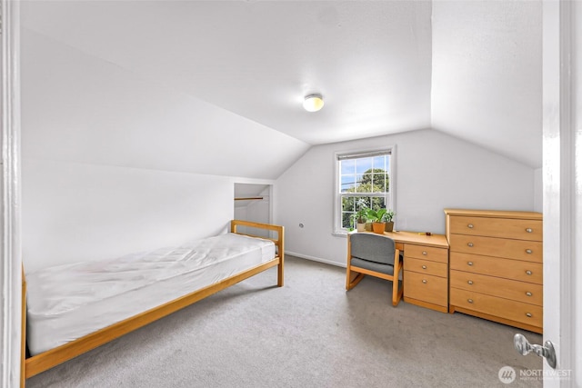 403 W Dravus St, Seattle, WA 98119 - carpeted bedroom with lofted ceiling and baseboards