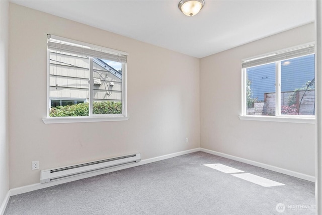 3017 Government Way, Seattle, WA 98199 - unfurnished room featuring a baseboard radiator, plenty of natural light, and carpet floors