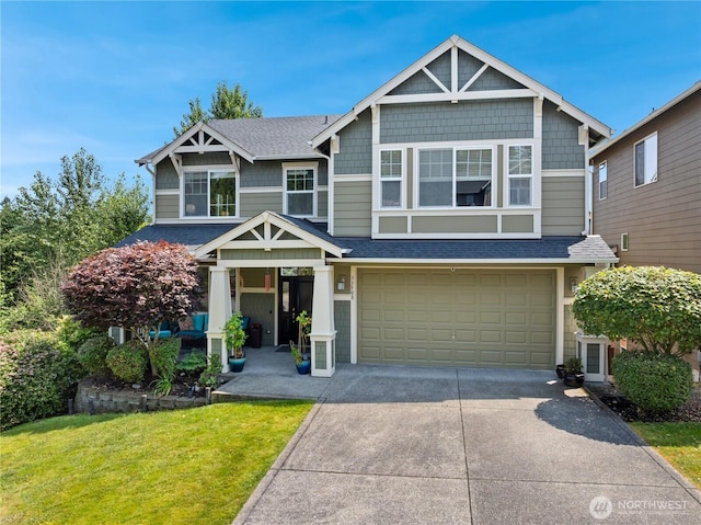 33908 12th Pl SW, Federal Way, WA 98023 - craftsman inspired home featuring an attached garage, driveway, roof with shingles, and a front yard
