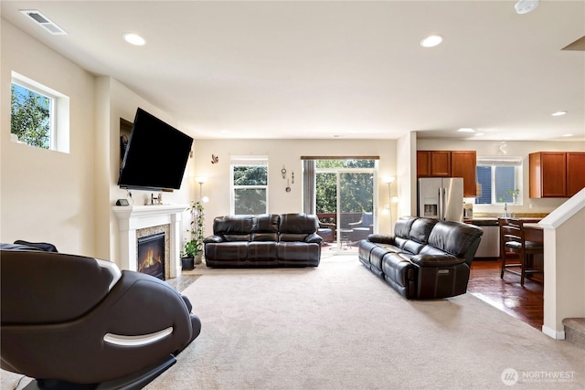 33908 12th Pl SW, Federal Way, WA 98023 - carpeted living room with a glass covered fireplace and recessed lighting