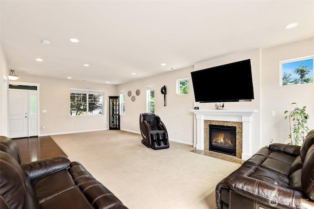 33908 12th Pl SW, Federal Way, WA 98023 - living room with recessed lighting, healthy amount of natural light, carpet flooring, and a fireplace with flush hearth