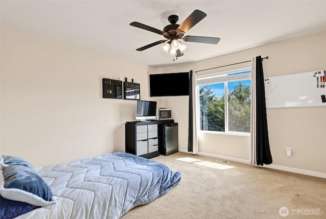 33908 12th Pl SW, Federal Way, WA 98023 - bedroom with freestanding refrigerator, carpet floors, and ceiling fan