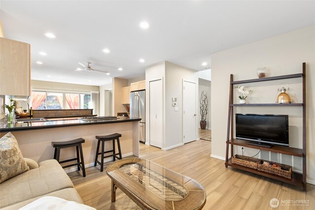 11211 NE 106th Pl, Kirkland, WA 98033 - living area with recessed lighting, light wood-style flooring, and a ceiling fan