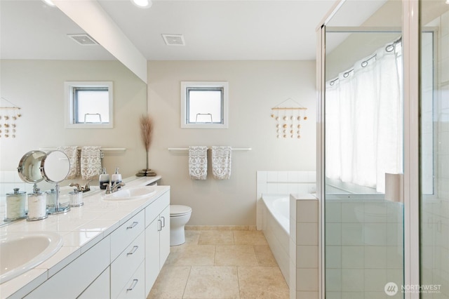 11211 NE 106th Pl, Kirkland, WA 98033 - bathroom with double vanity, a garden tub, a shower, and tile patterned flooring
