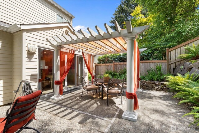 11211 NE 106th Pl, Kirkland, WA 98033 - view of patio with a pergola and outdoor dining area