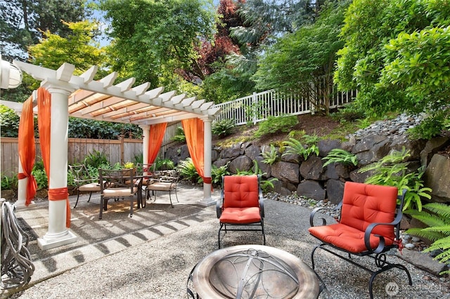 11211 NE 106th Pl, Kirkland, WA 98033 - fenced backyard featuring outdoor dining space, a pergola, and a patio area