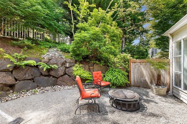 11211 NE 106th Pl, Kirkland, WA 98033 - view of patio featuring a fire pit