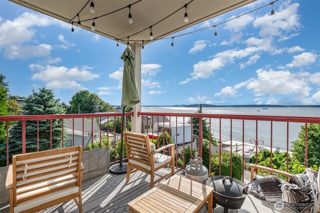 5310 SW College St, Seattle, WA 98116 - balcony featuring view of water and beach