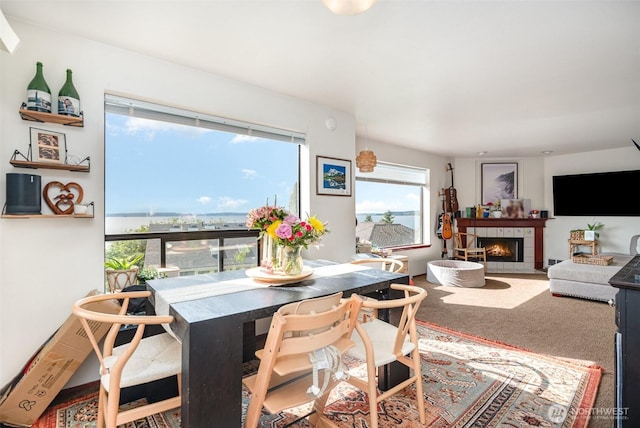 5310 SW College St, Seattle, WA 98116 - carpeted dining area with a fireplace