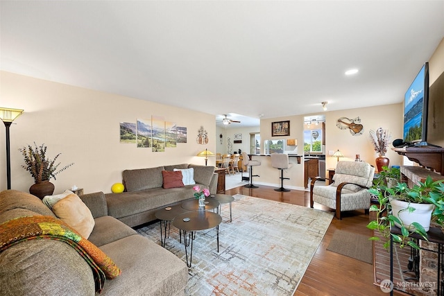 11008 36th Avenue Ct E, Tacoma, WA 98446 - living room featuring wood finished floors and ceiling fan