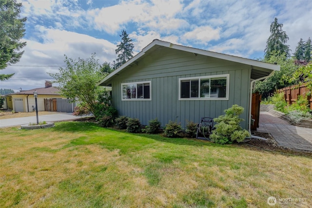 3024 Carpenter Loop SE, Olympia, WA 98503 - view of side of home with board and batten siding