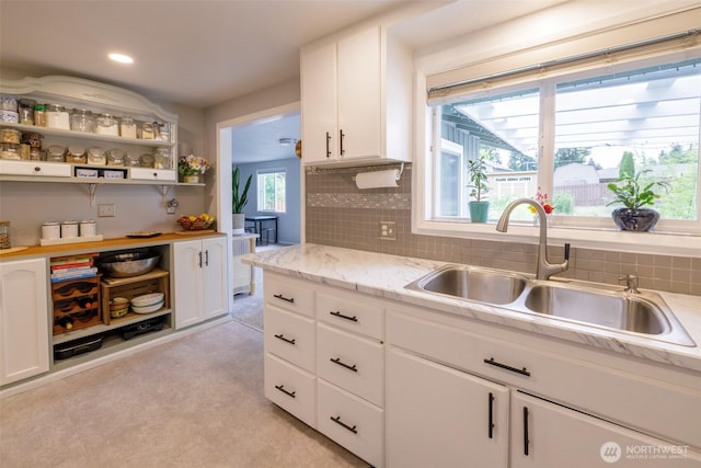 3024 Carpenter Loop SE, Olympia, WA 98503 - kitchen featuring light countertops, white cabinetry, backsplash, open shelves, and recessed lighting