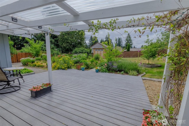3024 Carpenter Loop SE, Olympia, WA 98503 - wooden deck featuring a pergola, a fenced backyard, and a shed