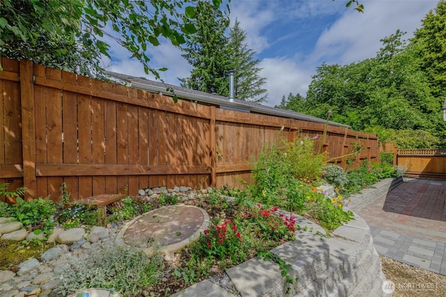 3024 Carpenter Loop SE, Olympia, WA 98503 - fenced backyard with a patio area