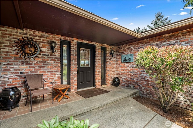 3822 School St, Wenatchee, WA 98801 - view of exterior entry with brick siding and a porch