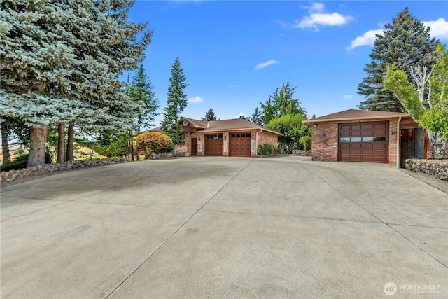 3822 School St, Wenatchee, WA 98801 - view of front of home with brick siding and driveway