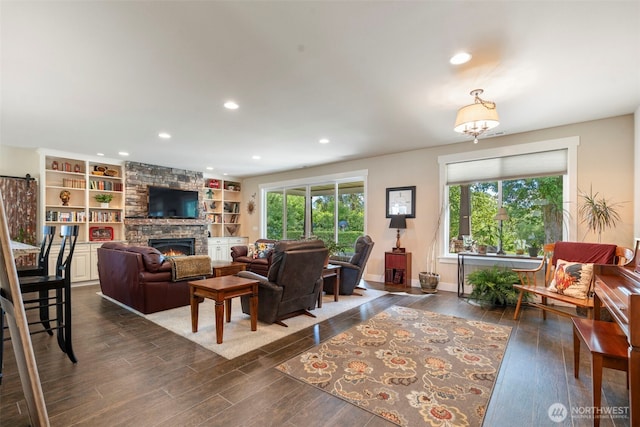 2322 Rice Rd, Chehalis, WA 98532 - living area featuring a fireplace, dark wood-style floors, and recessed lighting