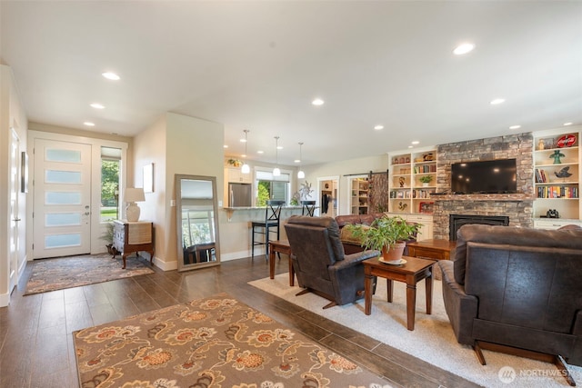 2322 Rice Rd, Chehalis, WA 98532 - living room with recessed lighting, dark wood-style flooring, and a fireplace