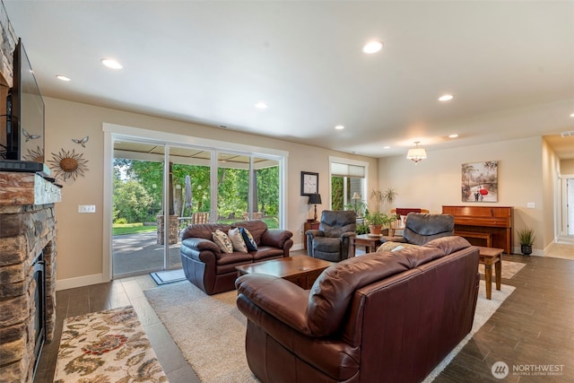 2322 Rice Rd, Chehalis, WA 98532 - living area featuring a stone fireplace, recessed lighting, and wood finished floors