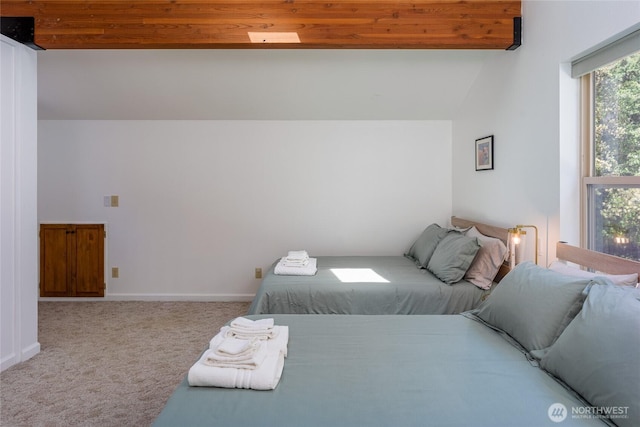 227 Bromley Dr, Orcas Island, WA 98245 - carpeted bedroom featuring lofted ceiling and baseboards