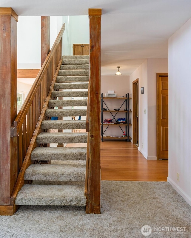 227 Bromley Dr, Orcas Island, WA 98245 - stairs featuring carpet floors and wood finished floors