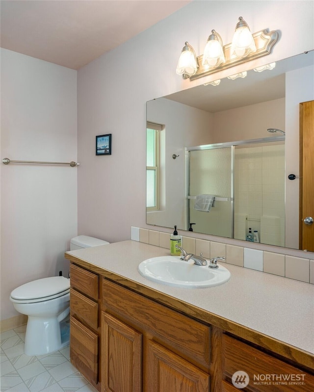 227 Bromley Dr, Orcas Island, WA 98245 - full bathroom featuring vanity, a stall shower, and tile patterned floors