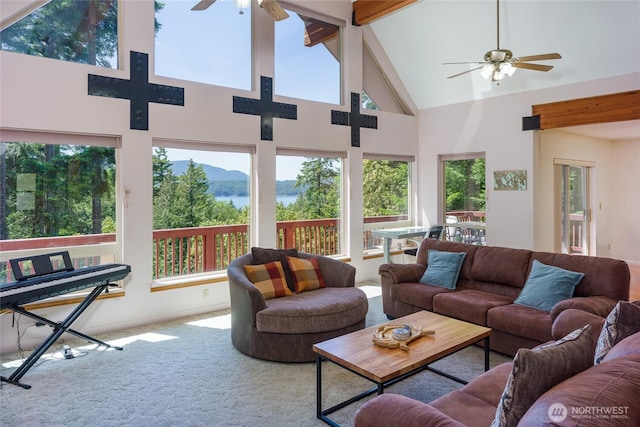 227 Bromley Dr, Orcas Island, WA 98245 - living area with ceiling fan, carpet floors, high vaulted ceiling, and a mountain view