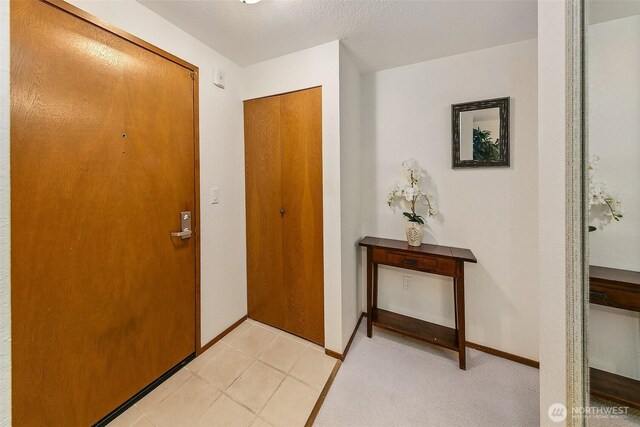 1130 5th Ave S Unit 103, Edmonds, WA 98020 - foyer with baseboards
